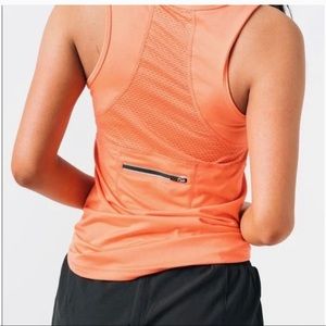 Zyia workout tank in lovely orange with back zip for money or keys
